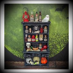 an old fashioned halloween shelf with spices and condiments on it in front of a spooky green background