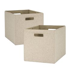 two beige storage bins with handles