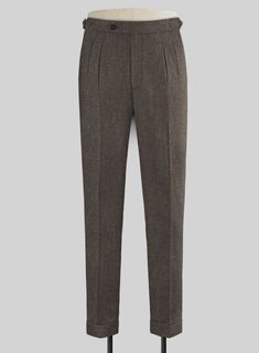 Incorporate refined, elegant style into your formal rotation with our Carre Brown Highland Tweed Trousers. Crafted from wool, its deep tone has the right amount of poise to make a strong statement wherever you go.  Look Includes   Carre Brown Tweed Fabric  Cross Pocket  Forward 2 Pleats  Side Tabs (No Loops)- Arrow Shape  Bottom Cuff (1.5")  Two Welted Back Pockets on Trousers   Click 'Customize Now' to modify the look if needed.  Lining: Viscose, Dry Clean. Loose Tweed Pants, Grey Tweed Suit, Herringbone Tweed Jacket, White Linen Suit, Green Velvet Jacket, Peaky Blinders Suit, Royal Blue Suit, Fabric Cross, Tweed Trousers