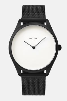 A minimal, modernist watch with a soft white, pearlized dial. Paired with a matte black mesh band. Minimalist Watch Women, Watch Minimalist, Minimalist Watch, Watch Women, Saddle Leather, Telling Time, Navy Leather, Soft White, Black Mesh