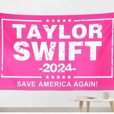 a pink wall hanging with the words taylor swift and save america again written on it