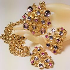 Vintage Jose Barrera 'Marbella' Necklace Earrings Set. Signed. Circa1990s. Flawless Pristine Condition. Elegant And Romantic Pinks And Lavenders. "Marbella' Is A Textured Baroque 3 Chain Strand 22" Inch Necklace With A 2.40" X 2.40" Inch Jeweled Medallion Center Clasp. Clip Earrings Are 2.00" X 1.30" Inches In Size. The Closure Is Secure And The Clips Are Snappy. Simply Gorgeous In Every Way. Please Feel Free To Contact Me With Any Questions. Thank You For Stopping By My Closet. Elegant Jeweled Pink Jewelry Sets, Elegant Pink Jeweled Jewelry Set, Pink Jeweled Jewelry Sets For Party, Pink Jeweled Jewelry For Celebration, Formal Pink Necklaces With Matching Earrings, Pink Celebration Jewelry With Jewels, Evening Pink Costume Jewelry, Pink Costume Jewelry For Evening, Formal Pink Costume Jewelry