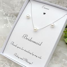 the bridesmaid gift set includes two pearl necklaces