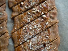 several pieces of bread with nuts on top