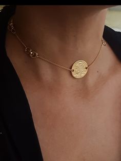 "A beautiful choker necklace designed in a boho chic style perfect for every day and evening. the necklace made from gold 24 K plated brass in very high quality and decorated with an Infiniti pendant in the side and coin in its center. chain size : 11.8\" (30cm) up to 17.7\" (45cm). pendant width: 0.98\" (2.5cm) Pendant height: 0.98\" (2.5cm) ♦ This piece of jewelry is perfect as a gift for yourself, for a friend, Valentine's day or a birthday. If you're interested in sending a gift to a third p Bohemian Choker Chain Necklace As Gift, Bohemian Festival Choker With Clavicle Chain, Bohemian Choker Chain Necklace For Gifts, Bohemian Adjustable Choker Chain Necklace, Adjustable Bohemian Choker Chain Necklace, Bohemian Clavicle Chain Choker Necklace, Bohemian Choker With Adjustable Chain, Adjustable Gold-plated Choker, Elegant Coin Pendant Choker Necklace