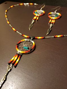 a necklace and earring set with beads