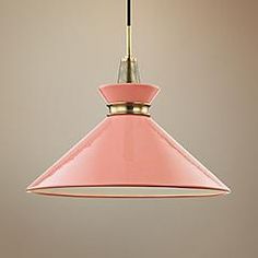 a pink light hanging from a ceiling fixture