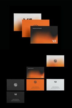 an orange and black business card is displayed on a black background with the letter y