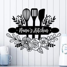 Nana's Kitchen Metal Sign, Cute Kitchen Sign, Personalized Kitchen Sign (with your choice of name: Grandma, Mimi, Gigi, Nana, Mama or First Name) Elevate your home decor with a beautiful personalized metal sign with kitchen tools and flowers. Made with 18 gauge steel and powder coated in your choice of 5 colors, this kitchen sign is built to withstand the elements for years of enjoyment. This is a perfect Christmas or birthday gift for the woman who loves to cook! A unique statement for her kitc Grandma Kitchen Sign, Grandma's Kitchen Sign, Personalized Kitchen Signs, Kitchen Decor Themes Colorful, Cricut Kitchen Ideas, Kitchen Wall Art Diy, Kitchen Boards, Wall Decor Trends, Gigi Grandma