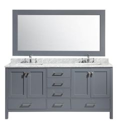 a bathroom vanity with two sinks and a large mirror over the top that hangs above it