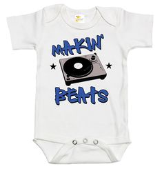 Rapunzie's trendy and music-inspired Baby Onesie with a cool DJ twist! This onesie is all about groove and rhythm, featuring a graphic of a DJ turntable with the caption "Makin' Beats." Your little one will rock the world with their undeniable style and love for music. Key Features: Premium Quality: Crafted from 100% cotton, this baby onesie ensures utmost comfort and breathability, allowing your baby to move and play with ease while keeping their delicate skin cozy and irritation-free. Short Sl Unisex Casual Onesie With Graphic Print, Casual Onesie With Graphic Print, Gender-neutral, Casual Graphic Print Onesie For Playtime, Unisex Graphic Print Onesie For Playtime, Music Key, Dj Turntable, Love For Music, Future Music, Pregnancy Announcement Gifts