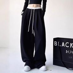 Vintage Baggy Loose Sweatpants Trendy Baggy High Waist Harem Pants, Gray High Waist Baggy Wide Leg Pants, Trendy Black High Waist Wide Leg Pants, High Waist Elastic Harem Pants For Streetwear, Trendy Wide Leg Harem Pants For Streetwear, Trendy Black Wide Leg Parachute Pants, High Waist Harem Pants For Streetwear, Casual Black High Waist Wide Leg Pants, Trendy Black Wide Leg Pants With Elastic Waistband