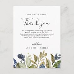 a thank card with blue flowers and greenery