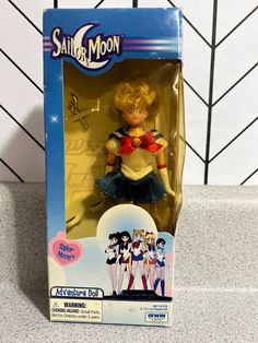 an action figure in a sailor moon box