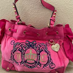 Amazing Juicy Bag In Excellent Condition! Has The Heart Charm With Bling. Super Iconic. Bling On The Bag. Soft Pink Velour. Minor Minor Minor Peeling In Some Of The Leather Areas. Overall This Bag Is Still 10/10 Condition Like The Item But Not The Price? Offers Are Always Accepted! Feel Free To Send An Offer Bundle 2+ Items & You Will Get Sent A Discounted Offer & You Will Save $ On Shipping Poshmark Ambassador Closet In Top Rated Seller Fast Shipping Average Same Day Smoke & Pet Free Home Luxury Recycled Packaging Hot Pink Juicy Couture, Juicy Bag, Pink Juicy Couture, Juicy Couture Purse, Purse Pink, Couture Handbags, Pink Bling, Juicy Couture Bags, Cute Bags