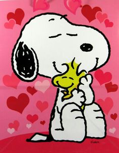 a painting of a snoopy dog holding a yellow object in its mouth with hearts on the background