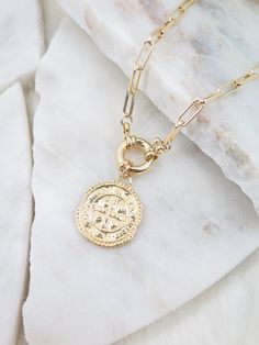 Details: - 18K Gold Filled Paperclip chain - Chain link size: Approx. 10mm x 4mm - Medallion size: Approx. 21mm - Medallion material: 18K Gold Plated - Spring ring clasp size: 13mm - Spring ring clasp material: 18K Gold Plated - This listing is only for ONE gold cross medallion necklace You can click the link below for curb chain necklace: https://www.etsy.com/listing/765388682/gold-link-chain-necklace-gold-filled?ref=shop_home_feat_3&pro=1&frs=1 Each item is individually placed on our M Gold Medallion Necklace, Gold Link Necklace, Thick Chain Necklace, Necklace Layered, Gold Link Chain, Gold Medallion, Gold Link, Medallion Necklace, Link Chain Necklace