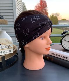 "💜Soft💙Versatile💛Stretchy💚Dental Headbands💜 Soft & Stretchy versatile Headbands measure approximately 4\" wide by approximately 8.5\" long when laid flat.  Original fabric starts out at approximately 20\" in length. Adult/teen sized.  Can be worn several different ways - wear with the top knot in the front for a faux turban look, off to the side or in the back for a wider headband coverage. This cute Black outlined Tooth Headband is the perfect headband for a Dental office.  They make great Stretch Black Headband, Casual Adjustable Black Headband, Casual Black Headband With Cotton Sweatband, Tooth Headband, Blue Headband, Dental Teeth, Stretchy Headbands, Dental Hygienist, Dental Assistant