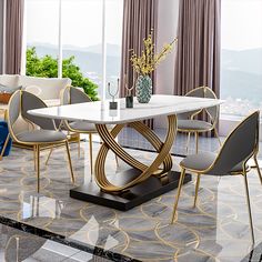 a dining room table with chairs and a vase on top of it in front of a large window