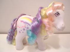 there is a toy pony with multicolored hair