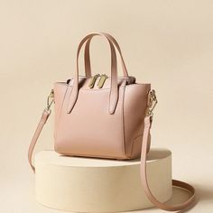 Buy Solid Color Leather Material Laides Short Handle Bag Female Shoulder Bag Purses and Handbag Elegant Women Small Tote Bag for only $54.99 at Julie bags! Elegant Solid Leather Satchel, Beige Satchel For Evening, Modern Rectangular Blush Shoulder Bag, Modern Blush Rectangular Shoulder Bag, Chic Pink Box Bag With Large Capacity, Chic Beige Box Bag With Removable Pouch, Elegant Beige Crossbody Box Bag, Feminine Satchel Shoulder Bag With Removable Pouch, Feminine Shoulder Bag With Removable Pouch And Double Handle