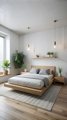 a bedroom with white walls and wood flooring has a large bed in the middle