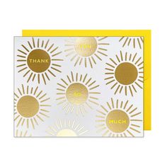 a thank card with gold foil on it and the words thank you written in large sunbursts