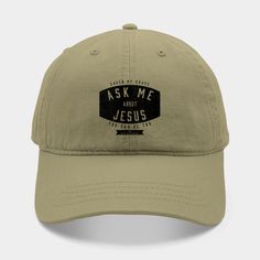 a khaki colored hat with the words ask me about jesus printed on it