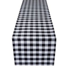 a black and white checkered table runner