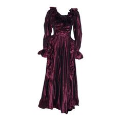 This is a beautiful piece of art by Yves Saint Laurent Rive Gauche, from mid-1970. The gown is iridescent purple silk taffeta with ruffles on the front bodice, neckline, hem, cuffs, and down the front skirt. It is fitted at the waist and wrist, with a zipper down the side-seam. Measurements: Bust-35" Waist-26" Hips-46" Sleeves: Shoulder to cuff 23.5" , Shoulder to edge of ruffle-28.5" Shoulder to Hem:59" Gowns Purple, Taffeta Gown, Iridescent Purple, Zip Dress, Frill Dress, Silk Taffeta, Couture Vintage, Rive Gauche, Alt Fashion