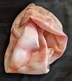 Beautiful flowing pink and taupe 100% Habotai silk scarf. It is hand painted with hand rolled hemmed edges.  It is hand dyed with Alcohol inks and is one of a kind.  Due to the fluid unpredictable nature of alcohol inks this design can never be recreated exactly. Alcohol inks create beautiful rich, vibrant colours that that are perfect for the flowing nature of pure silk. This unique piece of wearable art makes a thoughtful gift for a special someone or for yourself. Please note: colours may var Pink Hand-dyed Scarf, Pink Hand Painted Silk Scarves, Handmade Pink Silk Scarf, Handmade Pink Silk Scarves, Soft Cover Journal, Habotai Silk, Silk Scarf Painting, Hand Painted Silk Scarf, Hand Roll