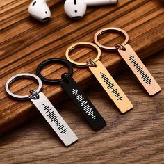 three keychains with the words, i love you to the moon and back