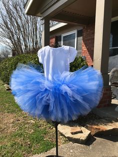 "This features a very full and fluffy tutu made in royal blue and white. This tutu can be made in your favorite team colors as well. Contact us for you custom made tutu. Thank you for shopping with Princess Tutus Boutique. If you have any questions please feel free to convo us at anytime and we will get back with you just as soon as possible. We strive to have great customer service and quick response on all contacts and also we strive to have great turnaround time on all our items. Please check Blue Tulle Tutu Dress With Ruffles, Blue Princess Tutu Dress For First Birthday, Princess Style Blue Tutu Dress For First Birthday, Blue Tulle Skirt Tutu Dress For Birthday, White Tulle Tutu Dress For Cake Smash, Maternity Tutu, Bachelorette Tutu, Adult Cake Smash, Newborn Tutu