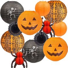 paper lanterns with faces and spider on them are arranged in a circle to look like jack - o - lanternes