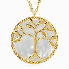 Wear this Tree of Life gold necklace as a representation of your beliefs in life. It features the Tree of Life as a protective charm. It is made of gold-plated copper and abalone shell, and it makes for a beautiful gift to a friend. Gold Abalone Shell Pendant Jewelry, Elegant Gold Necklace With Abalone Shell, Spiritual Shell Necklace As Gift, Gold Abalone Shell Round Jewelry, Mother Of Pearl Engraved Necklace For Gift, Engraved Mother Of Pearl Necklaces For Gifts, Gold Medallion Necklace With Mother Of Pearl, Gold Medallion Necklace In Mother Of Pearl, Gold Mother Of Pearl Medallion Necklace