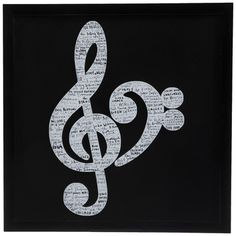 the treble is made out of musical notes on black paper with white writing in it