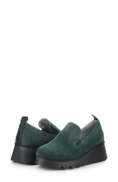 A sporty rubber wedge rewrites the casual-chic silhouette of a minimalist loafer crafted from velvety suede with gore insets and a heel tab for easy on/off. 2" heel Elastic gore insets Leather upper and lining/rubber sole Made in Portugal Wedge Loafers, Loafer Women, Fly London, Loafers For Women, Forest Green, Casual Chic, Slip On Sneaker, Nordstrom Rack, Rubber Sole