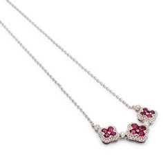 Gender: Ladies  Metal Type: 18K White Gold  Length: 16.00 Inches  Chain Width: 1.30 mm  Largest Flower Measurement: 9.80mm x 9.80mm  Weight: 4.50 grams  Ladies 18K white gold single strand collar diamond and ruby necklace. The metal was tested and determined to be 18K white gold. Engraved with "750". Pre-owned in excellent condition. Might shows minor signs of wear.  Bar Set in 18 Karat White Gold with:  Eight (8) natural, round-shaped, brilliant cut, rubies: Species: Natural Corundum Variety: N Luxury Flower Shaped Necklace With Brilliant Cut, Luxury Flower Necklace With Brilliant Cut, Luxury Flower-shaped Necklace With Brilliant Cut, Elegant White Gold Flower Charm Necklace, Luxury Flower-shaped Brilliant Cut Necklace, Elegant White Gold Flower Necklace, Silver Diamond Necklace With Flower Charm, Elegant Platinum Flower Jewelry, Elegant Flower-shaped Platinum Jewelry