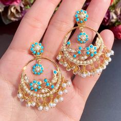 Featuring a pair of delicate chandbali earrings made in gold plated silver and embellished with pearls and turquoises. The earrings are approx 5cm in length All of Rudradhan's Gold Plated Jewellery is made using 925 Silver, real freshwater pearls and high quality ruby, emerald and sapphire beads. The default choice for studded stones used is synthetic that closely resemble original gemstones. Chandbali Earrings Gold, 22k Gold Jewelry Necklaces, Sapphire Beads, Gold Plated Jewellery, 22k Gold Jewelry, Chandbali Earrings, Pearl Necklace Set, Ruby Emerald, Gold Jewelry Necklace