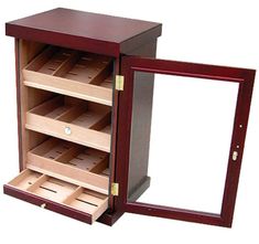 an open wooden jewelry box with drawers on the front and bottom shelves in different colors