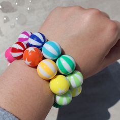 Add a colorful pop of beachy fun to your look with this summer stretchy bracelet. Large acrylic beach ball beads Clear elastic Fun Adjustable Stretch Bracelet For Vacation, Adjustable Playful Beaded Bracelets For Vacation, Playful Adjustable Beaded Bracelets For Vacation, Playful Multicolor Beaded Bracelets For Summer, Playful Adjustable Stretch Bracelet For Summer, Casual Beaded Bracelets For Beach Party, Multicolor Beachy Bracelets For Beach Party, Multicolor Beachy Bracelets For Beach Season, Beachy Multicolor Bracelets For Beach Party