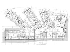 an architectural drawing shows the floor plan for a building with multiple floors and several rooms