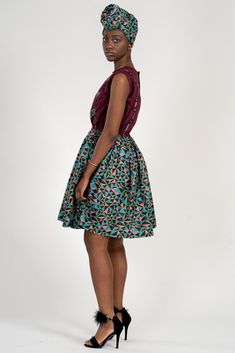 Our Abayomi African print dress is perfect for all occasions. Whether you want to dress simple yet sexy or want to go more elegant and classy, this is the right dress for you. Its bold colors will not leave you unnoticed. Great for spring and summer or just any season. Description: Savant mixture of 100% polyester African fabric and cotton fabric Zipper at the back Shirring on the waist to accommodate your waist Lined on the top and unlined on the skirt 2 side pockets Our model wears size S AFRI Fitted Purple Printed Midi Dress, Fitted Purple Printed Dress, Fitted Multicolor A-line Midi Dress, Printed Knee-length Midi Dress For Party, Printed A-line Mini Dress For Party, Elegant Vibrant Print Midi Dress For Party, Vibrant Print Fitted Midi Dress, Vibrant Print Knee-length Midi Dress, Elegant Midi Dress With Vibrant Print