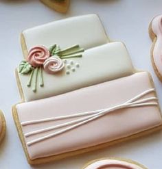 decorated cookies are sitting on a table