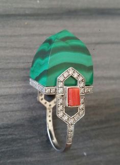 Unique and classic handmade Art Deco Style cocktail ring with a Genuine 50 Carat Malachite Pyramid measuring 16x16 mm set in a 14 kt yellow solid gold mounting,including 70 full cut diamonds Luxury Green Hallmarked Signet Ring, Luxury Green Collectible Rings, Unique Polished Emerald Ring For Formal Occasions, Modernist Green Ring For Formal Occasions, Art Deco Style, Cocktail Ring, Deco Style, Cocktail Rings, Handmade Art