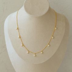 Metal: 18K Recycled Gold Plated On Brass Pearl: Freshwater Pearl A Style Chain Length: 390-440mm B Style Chain Length: 380-430mm C Style Chain Length: 410-460mm D Style Chain Length: 800mm E Style Chain Length: 400-450mm F Style Chain Length: 400-450mm G Style Chain Length: 380-450mm H Style Chain Length: 370-440mm I Style Chain Length: 480mm J Style Chain Length: 560mm K Style Chain Length: 1250mm Gold Pearl Necklace 16 Inch Length, 16 Inch Gold Pearl Necklace, Dainty Gold Bridal Necklace With Clavicle Chain, Minimalist Gold Bridal Necklace With Clavicle Chain, Minimalist Gold Bridal Necklace With Delicate Chain, Dainty Gold Drop Necklace With Pearl Chain, J Style, K Style, Pretty Jewelry Necklaces