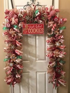 a door decorated with candy canes and cookies