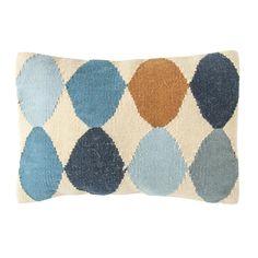 a blue and brown pillow on a white background