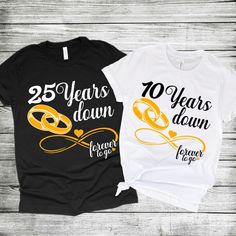 Surprise your husband/wife with this anniversary celebration tshirt. You can personalize with names if you wish. (Sold Separately) * 100% combed and ring-spun cotton (Heather colors contain polyester) * Fabric weight: 4.2 oz/yd² (142 g/m²) * Pre-shrunk fabric * Side-seamed construction * Shoulder-to-shoulder taping * Blank product sourced from Guatemala, Nicaragua, Mexico, Honduras, or the US This product is made especially for you as soon as you place an order, which is why it takes us a bit lo Anniversary Crew Neck T-shirt With Custom Print, Anniversary White Custom Print T-shirt, Anniversary T-shirt With Custom Print, Short Sleeve, Custom Print Black T-shirt For Anniversary, Black Custom Print T-shirt For Anniversary, Customizable Black T-shirt For Anniversary, Customizable Crew Neck T-shirt For Anniversary, Personalized Anniversary T-shirt, Personalized T-shirt For Anniversary