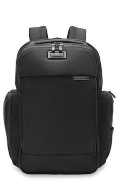 Anything but traditional, this multifunctional backpack has separate compartments for electronics and accessories, and a private packing area for clothing.Closure: Two-way top-zip closure.Exterior features: With its padded, ergonomic shoulder straps, you'll be navigating through your travels in comfort. It also has a slip-through back panel to allow it to slide over rolling bags. A front zip compartment features additional pockets that are ideal for storing smaller accessories. A left side pocke Modern Backpack With Anti-theft Pocket For Trips, Modern Rectangular Backpack With Functional Pockets, Modern Nylon Backpack Luggage, Functional Business Nylon Backpack, Modern Black Luggage With Functional Pockets, Classic Travel Bag With Anti-theft Pocket, Functional Standard Backpack Luggage For Business Trips, Functional Standard Backpack For Business Trips, Rectangular Business Backpack With Functional Pockets